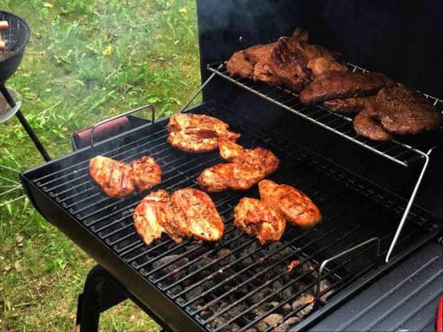 Chicken And Meat On A Barbecue Grill