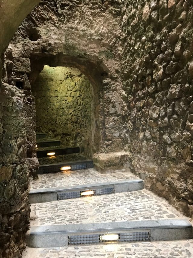 Curved Tunnel With Stairs In Cobblestone Castle