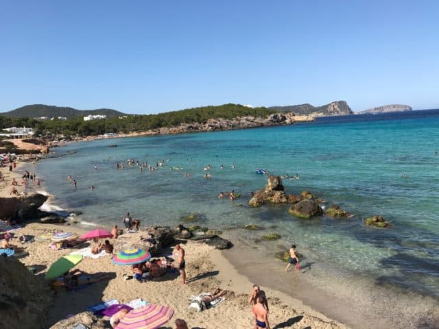 Public Beach In Ibiza In Spain Full Of People