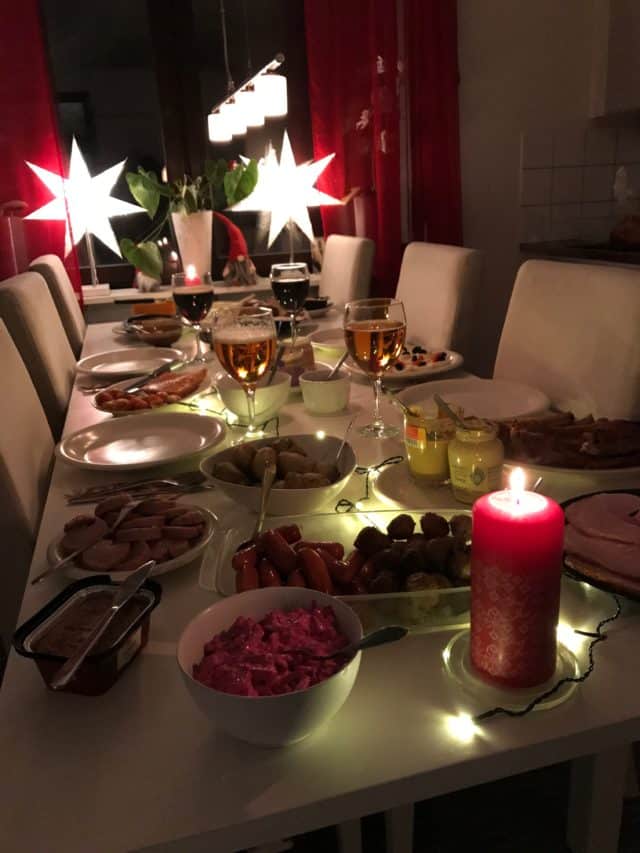 Swedish Christmas Dinner Table With Candles And Lights