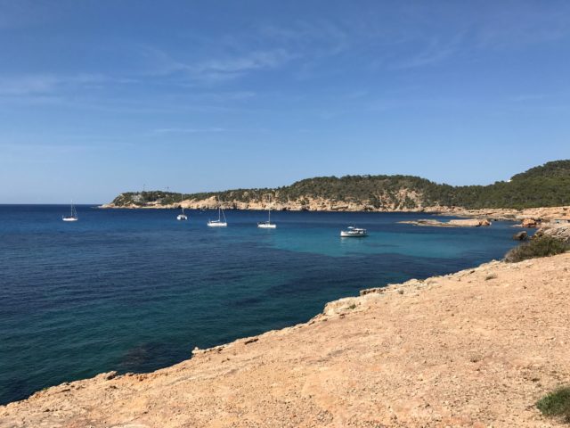 Exotic Cove With Blue Sky And Boats In Ibiza