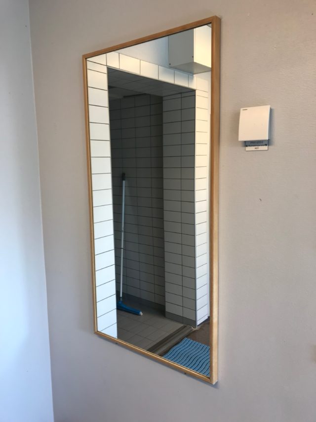 Wooden Wall Mirror In Locker Room