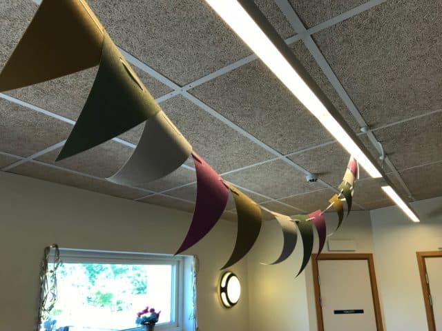 Colored Party Flags On A String In The Ceiling