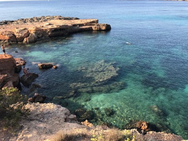 Swimmers In Tropical Water By Ibiza Coast