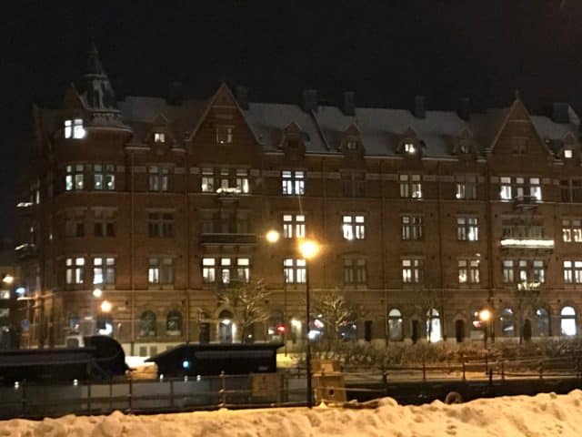 Posh Building At Winter With Cozy Lights