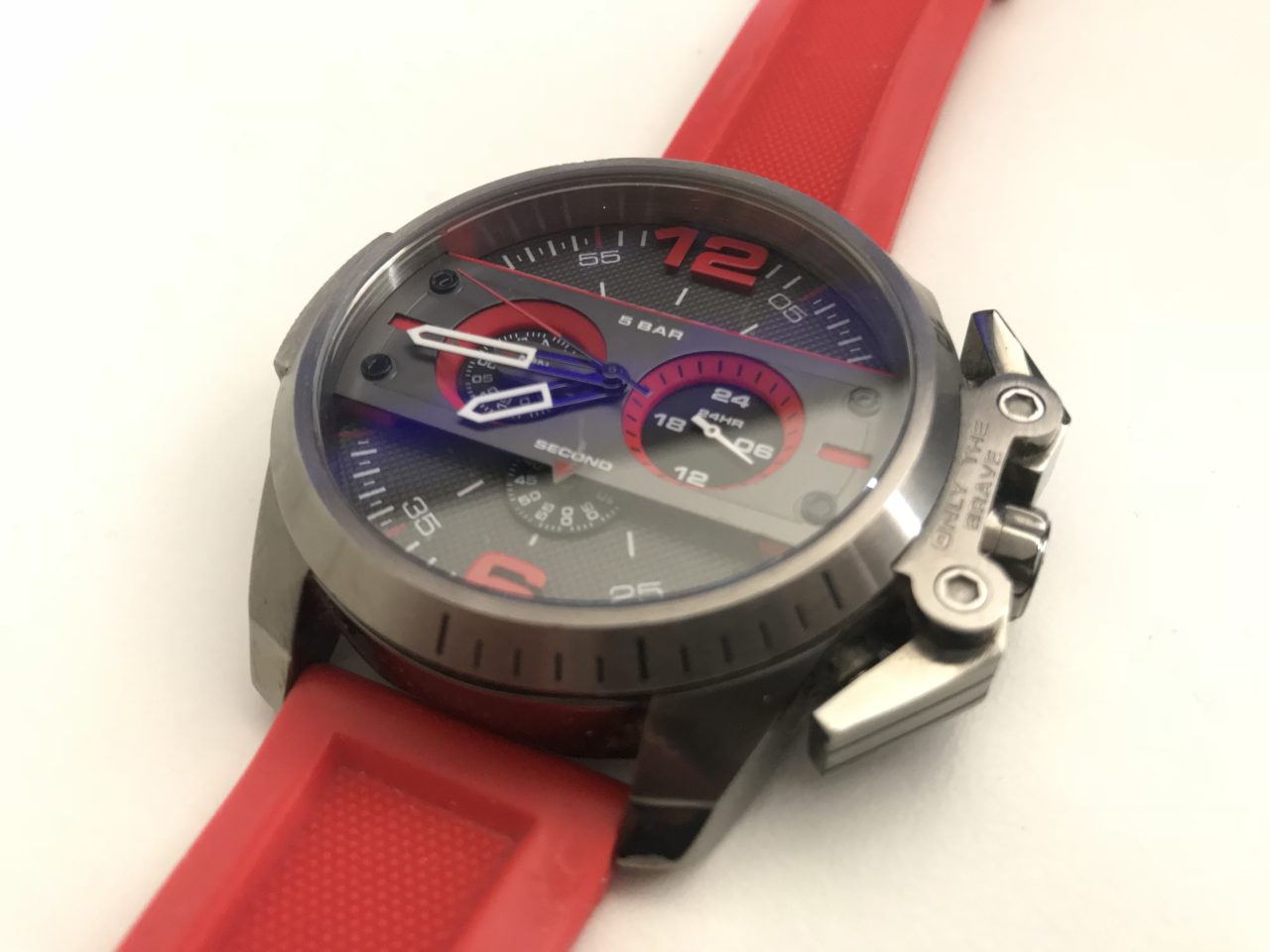 Closeup Of A Diesel Watch With A Red Wristband