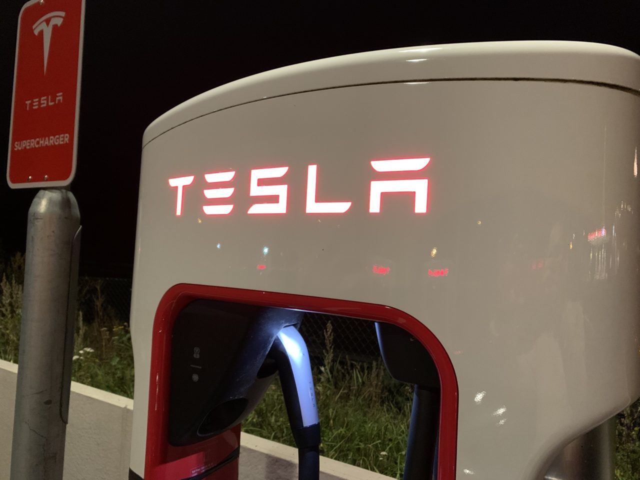Tesla Supercharger Station Stall Glowing Logo