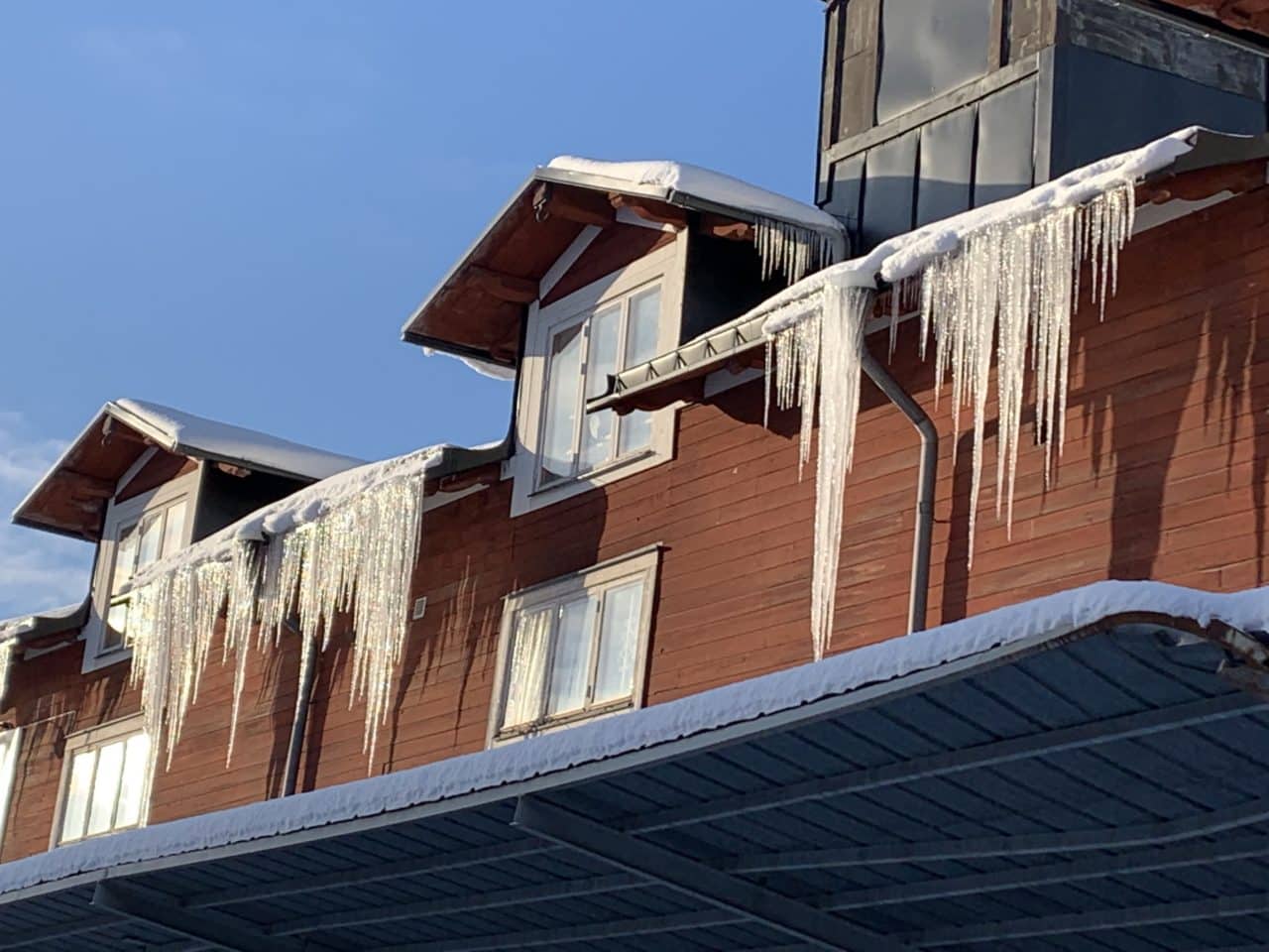 Icicles Hanging From A Winter Roof