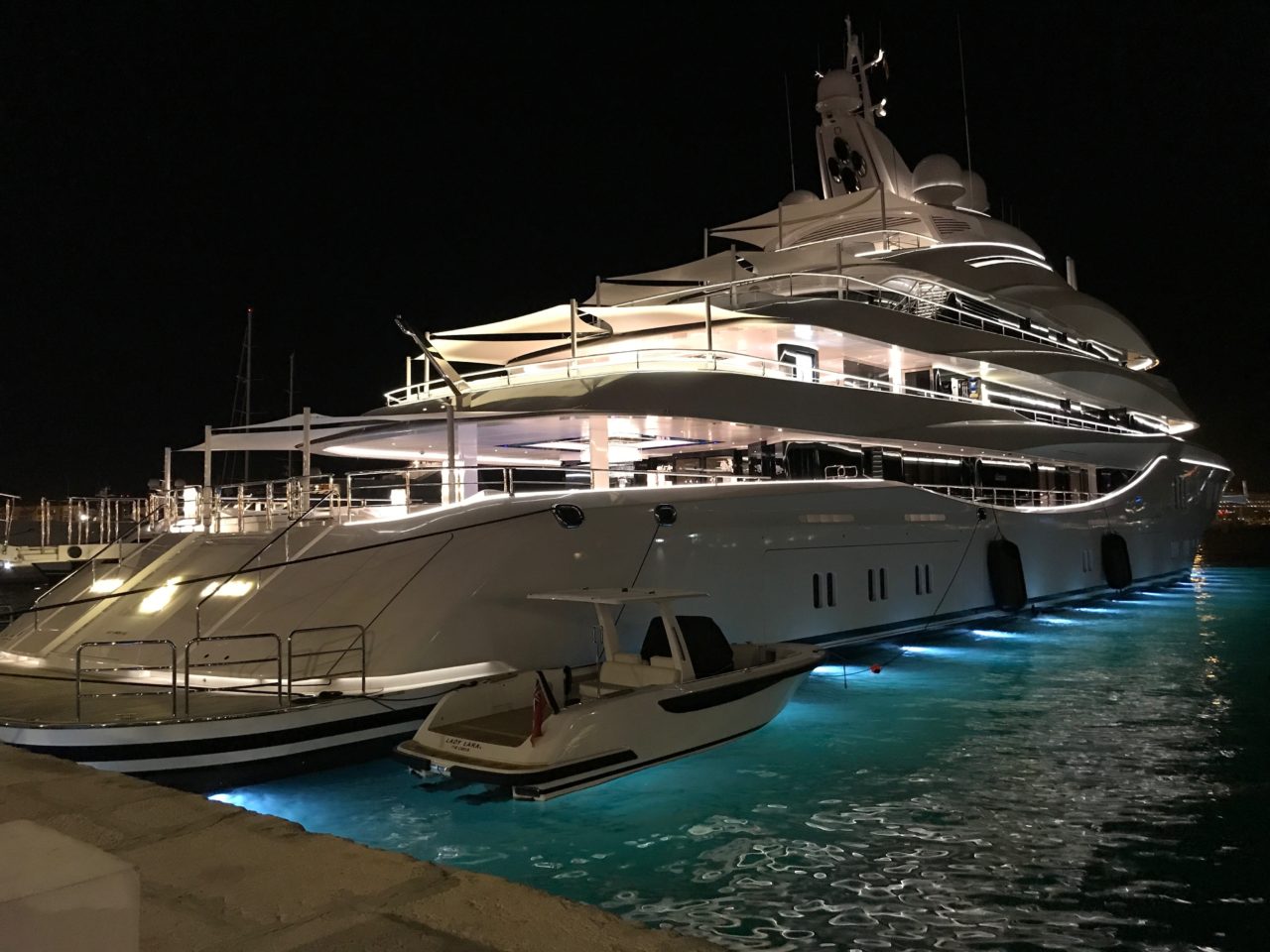 Luxury Yacht At The Dock In Ibiza City At Night