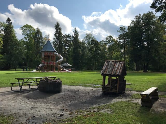 Playground With A Park Bench And Fireplace