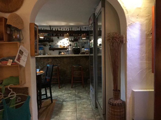 Small Spanish Bar With Bottles And Bar Stools