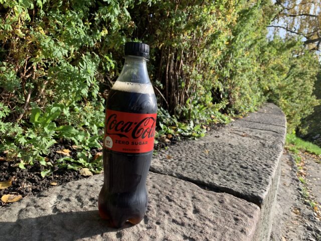 Coca Cola Zero Plastic Bottle On A Stone Wall