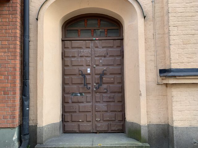 Large Old Brown Wooden Door With Handles