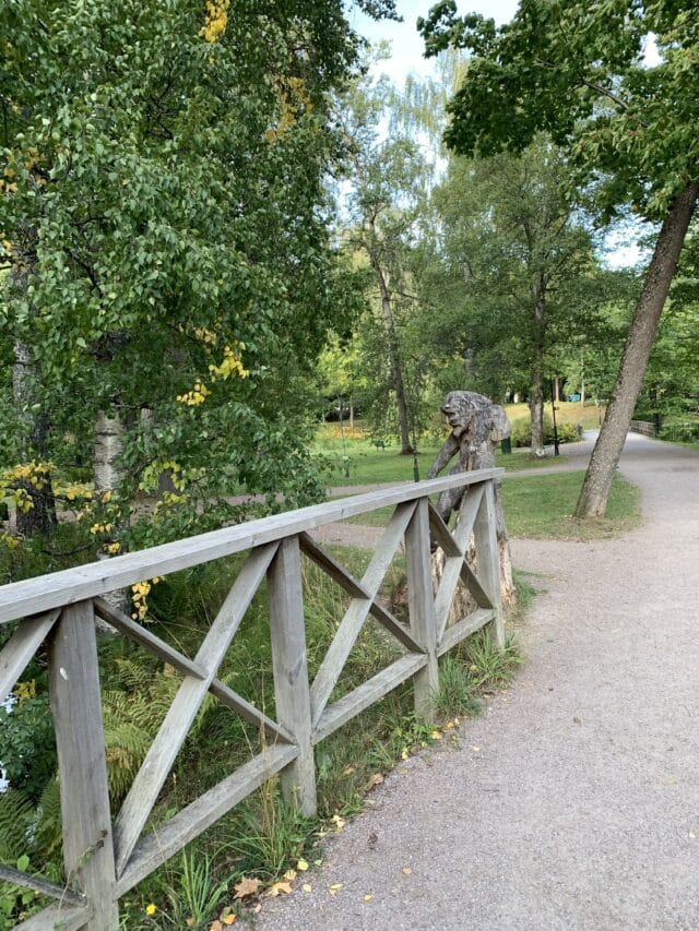 Wooden Park Fence With Grave Paths