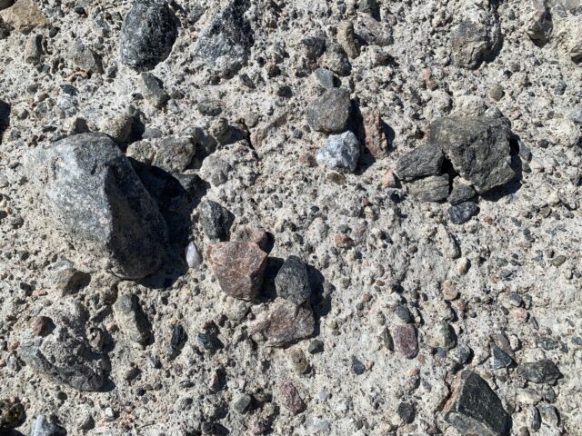 Rocks And Pebbles Embedded In Dirt Texture Pattern