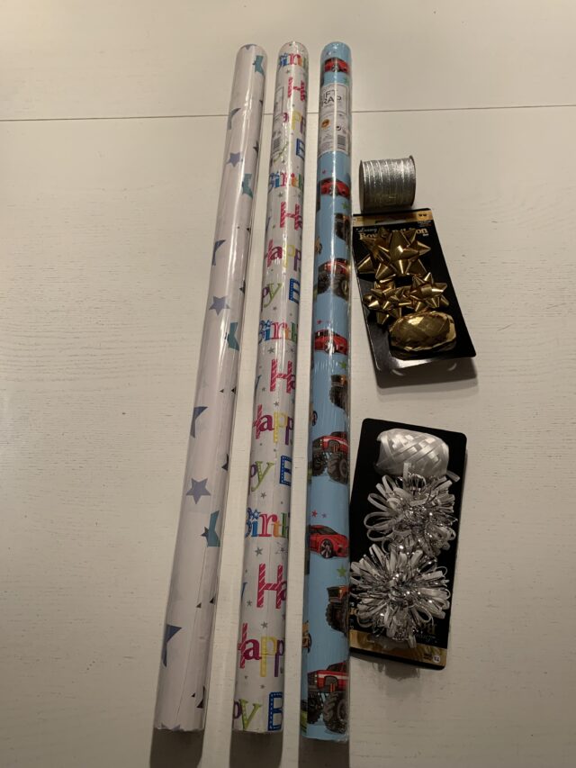 Rolls Of Gift Wrap Paper And Decorations