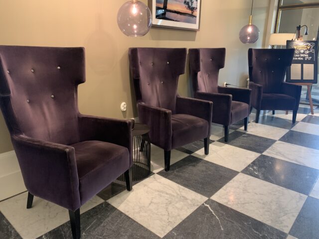 Large Purple Velvet Chairs In Lounge