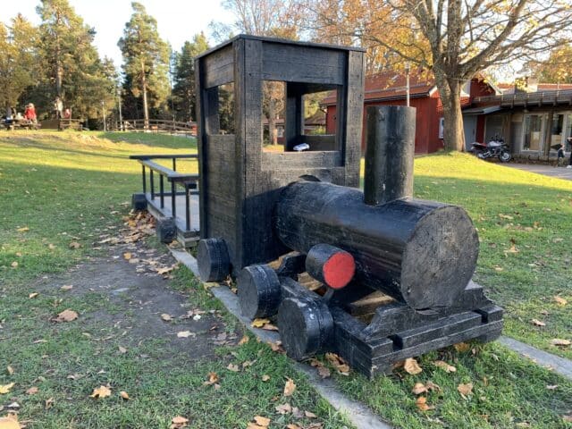 Wooden Playground Train And Trailer In A Park